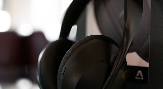 Can you use noise-cancelling headphones for shooting?