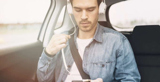 Can you drive with headphones on?